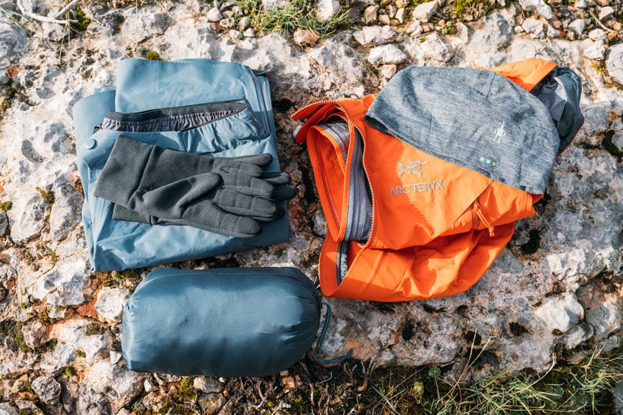 My Backpacking Checklist (How To Pack Gear For A Trek) - Backpacking Outerwear Gear 900x600