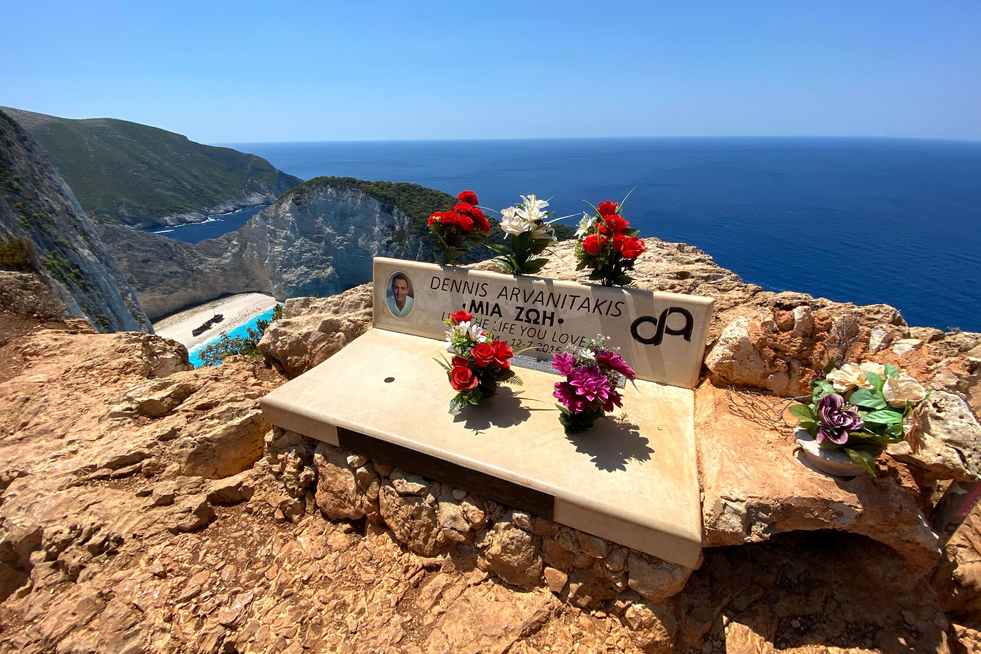 Exploring Navagio Beach (Shipwreck Beach) In Zakynthos, Greece 11 Memorial with Flowers